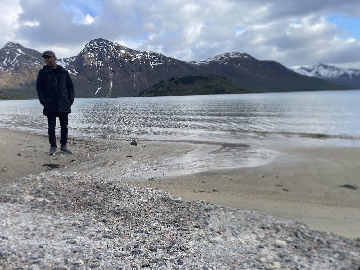 Manoj by a fjord in Northern Sweden